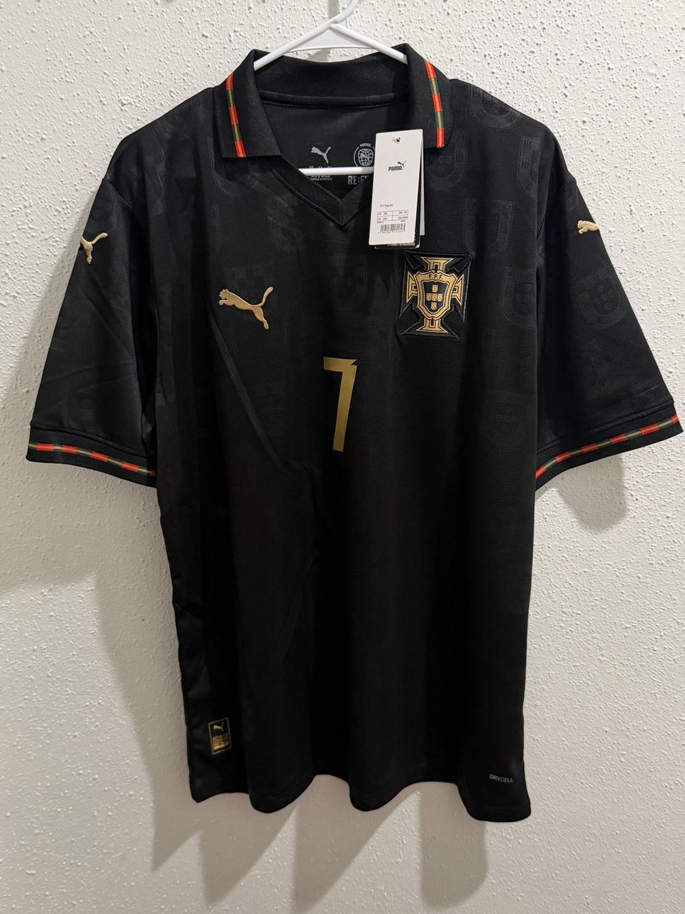 Puma Men’s Black Portugal Football Jersey with Gold Crest